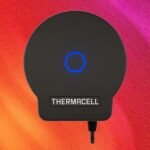 Thermacell LIV 2.0 Smart Mosquito Repellent System repellers installed around an outdoor patio or pool area, emitting a protective vapor.