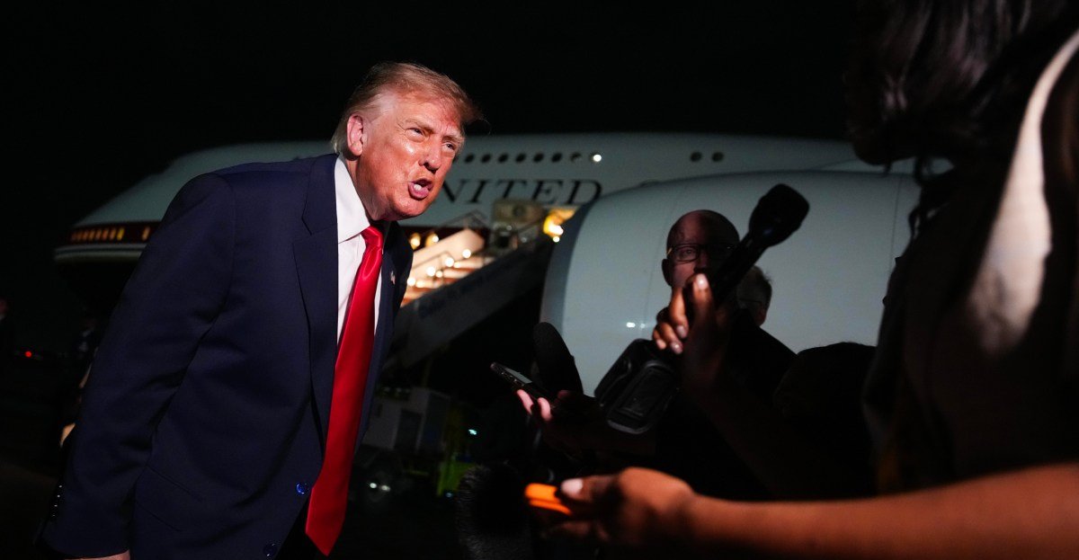 President Donald Trump speaks to reporters on the tarmac before boarding Air Force One, against a backdrop of escalating tensions with the press.