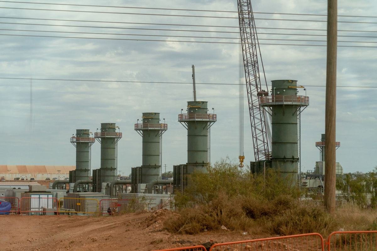 Conceptual image representing AI compute power or data centers, with Nscale and Anthropic logos.