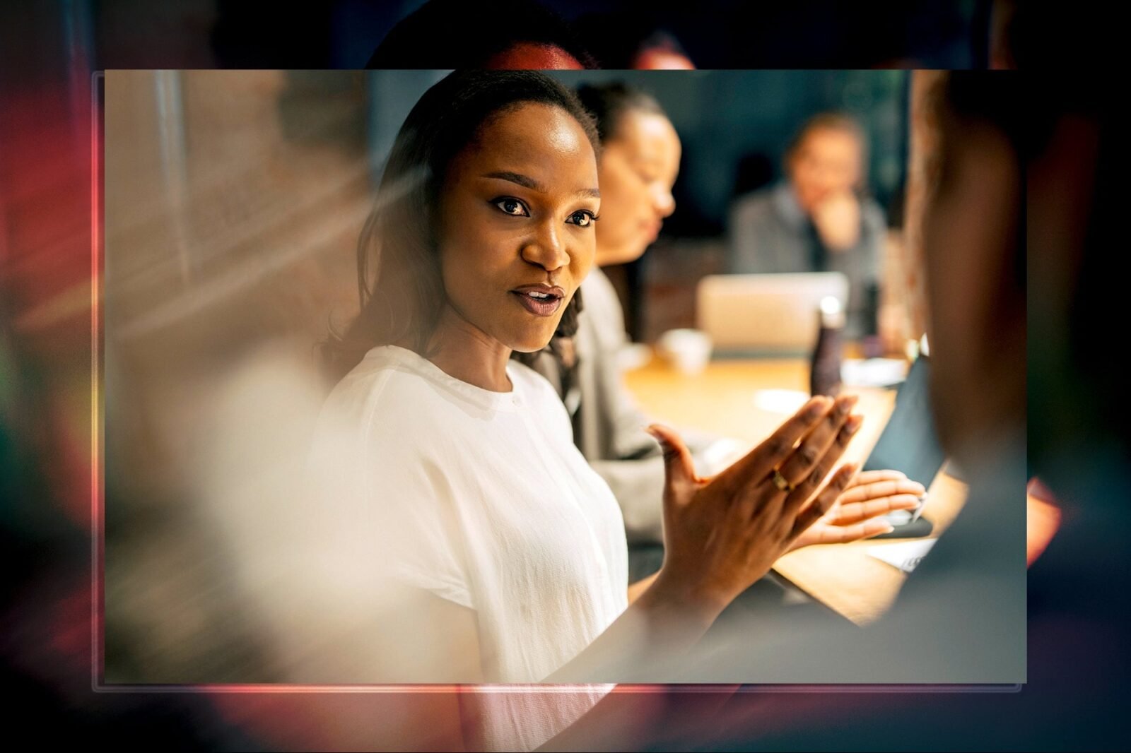 The Unseen Blueprint: How Black Women's Leadership is Shaping the Future of Work 3 Diverse group of professional women collaborating in a modern office setting
