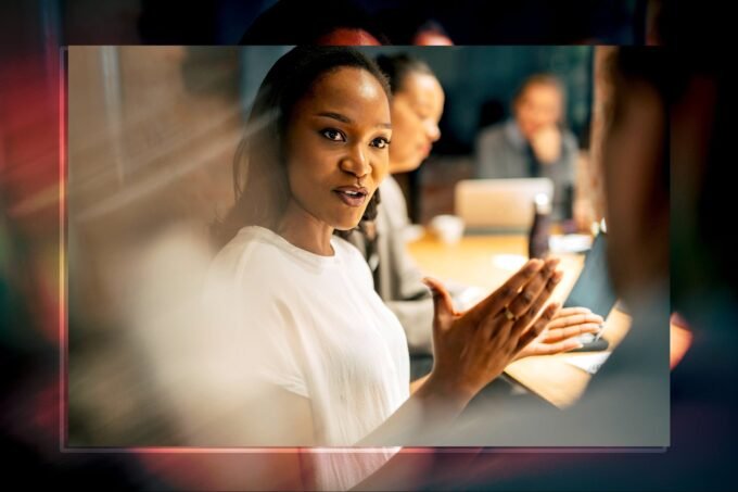 Diverse group of professional women collaborating in a modern office setting