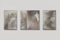 Three unique, handcrafted mirrors from Boldizar Senteski's 'Erosion Collection' displayed at StudioTwentySeven, showcasing oxidized surfaces and polished stainless steel frames.