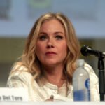 Christina Applegate speaking publicly, representing her advocacy journey