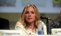 Christina Applegate speaking publicly, representing her advocacy journey