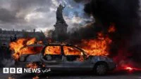 صورة توضيحية للاضطرابات في فرنسا أو سفينة في البحر الأسود أو منشأة طاقة متضررة في أوكرانيا