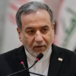 صورة لعباس عراقجي أو مبنى البرلمان الإيراني