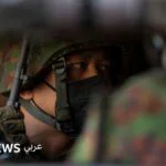 صورة تظهر جنوداً من جيش ميانمار، في إشارة إلى حملات التجنيد القسري التي تستهدف الشباب.