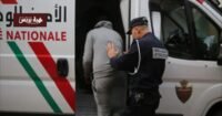 صورة تظهر عناصر الشرطة أو شعار الإنتربول، مع إشارة إلى التعاون الأمني الدولي.