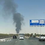 صورة لدخان يتصاعد من مستودع في مطار الملك خالد الدولي بالرياض بعد هجوم
