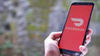 DoorDash and Instacart logos side-by-side, symbolizing their $17 billion merger and the consolidation of grocery delivery services.