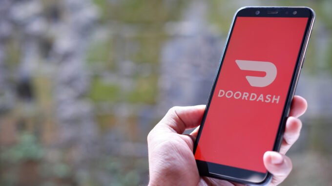 DoorDash Acquires Instacart in $17 Billion Mega-Merger: Reshaping On-Demand Delivery 9 DoorDash and Instacart logos side-by-side, symbolizing their $17 billion merger and the consolidation of grocery delivery services.