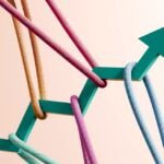 Beyond the Buzz: Why Your Networking Efforts Might Be Stalling Your Business 6 A person shaking hands, with a blurred background of a bustling business event, symbolizing networking.