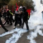 France's Digital Dilemma: Tech Giants Summoned Amidst Widespread Unrest and Online Incitement 8 French government officials meeting with representatives from major online platforms like TikTok and eBay, with protest imagery in the background.