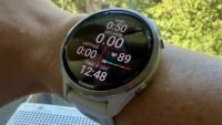 Garmin watch displaying heart rate data and zones on a wrist