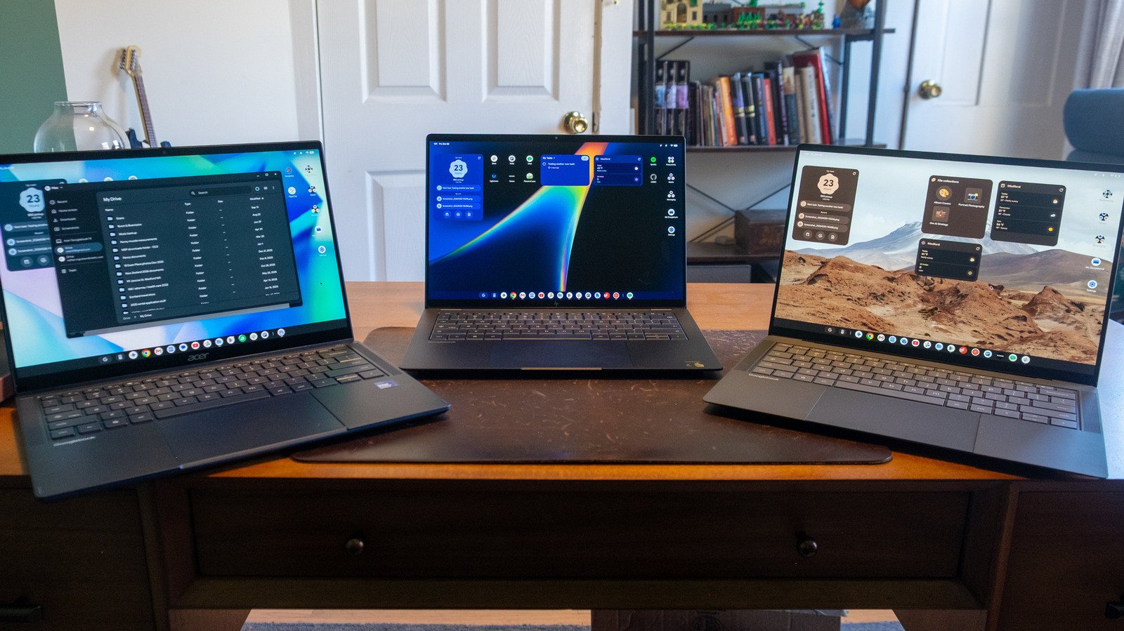 A sleek Googlebook laptop displaying its Android-powered desktop interface, with a smartphone nearby for integration.