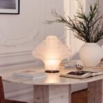 Gubi Lotus Table Lamp, a sculptural design by Carlo Nason, featuring layered Murano glass shades
