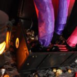 Unleash Spooky Surprises: Craft Your Own Magnet-Activated Halloween Scare Box! 8 A magnet-activated Halloween scare box with its lid snapping open, revealing spring-loaded snakes lunging out.
