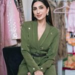 Megha Rao, founder of holiCHIC, showcasing her unique fashion designs.