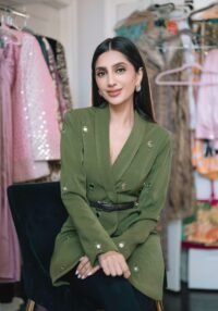 Megha Rao, founder of holiCHIC, showcasing her unique fashion designs.