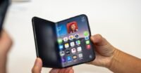 A folded and unfolded view of the new Apple iPhone Duo smartphone, showcasing its dual screens and sleek design.
