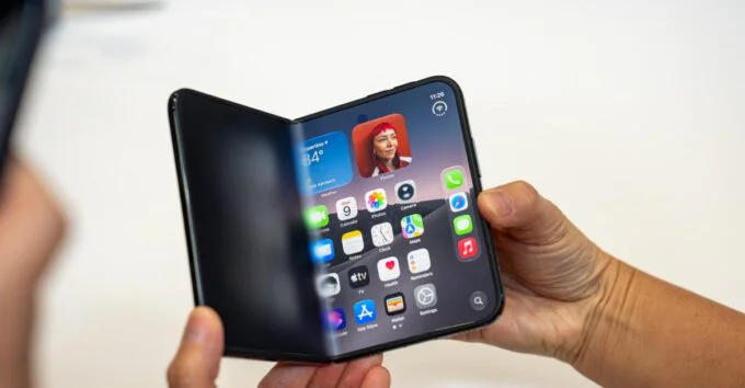 A folded and unfolded view of the new Apple iPhone Duo smartphone, showcasing its dual screens and sleek design.