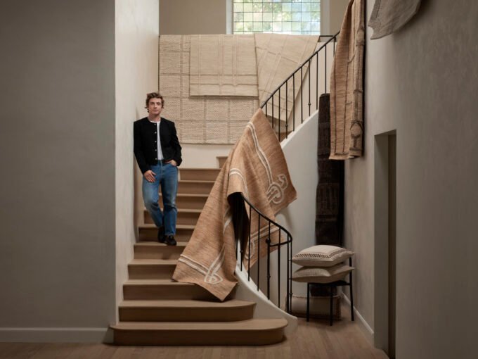Jeremiah Brent with the hand-tufted wool Fori rug in Espresso Brown, part of his architectural collection with Loloi.