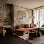 Luxurious lobby of Mandarin Oriental The Landmark, Hong Kong, showcasing Joyce Wang Studio's design with an undulating staircase and custom artworks.