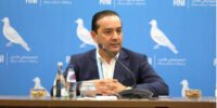 Fatima Ezzahra El Mansouri, coordinatrice du PAM, et Mohamed Chaouki, président du RNI, lors d'un événement politique au Maroc.