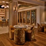 Interior view of Napa Bistro and Wine Bar Stonecrest in Charlotte, showing a blend of French bistro and Napa Valley farmhouse design elements.
