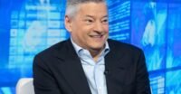 Netflix co-CEO Ted Sarandos speaking at an event, representing the leadership facing company challenges.