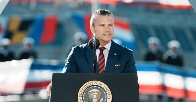A gavel and a US flag, symbolizing justice and military law.