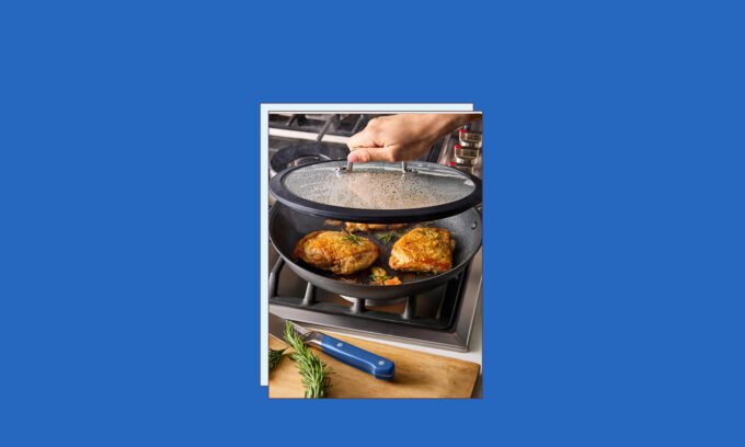 A selection of Misen's non-toxic carbon steel cookware and stainless steel food storage containers on a kitchen counter.
