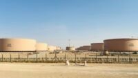 Fuel tanks at a depot, symbolizing global energy supply and the volatility of oil markets.