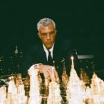 A single entrepreneur standing confidently amidst a futuristic cityscape, surrounded by glowing AI interfaces and digital agents, symbolizing a one-person billion-dollar startup.