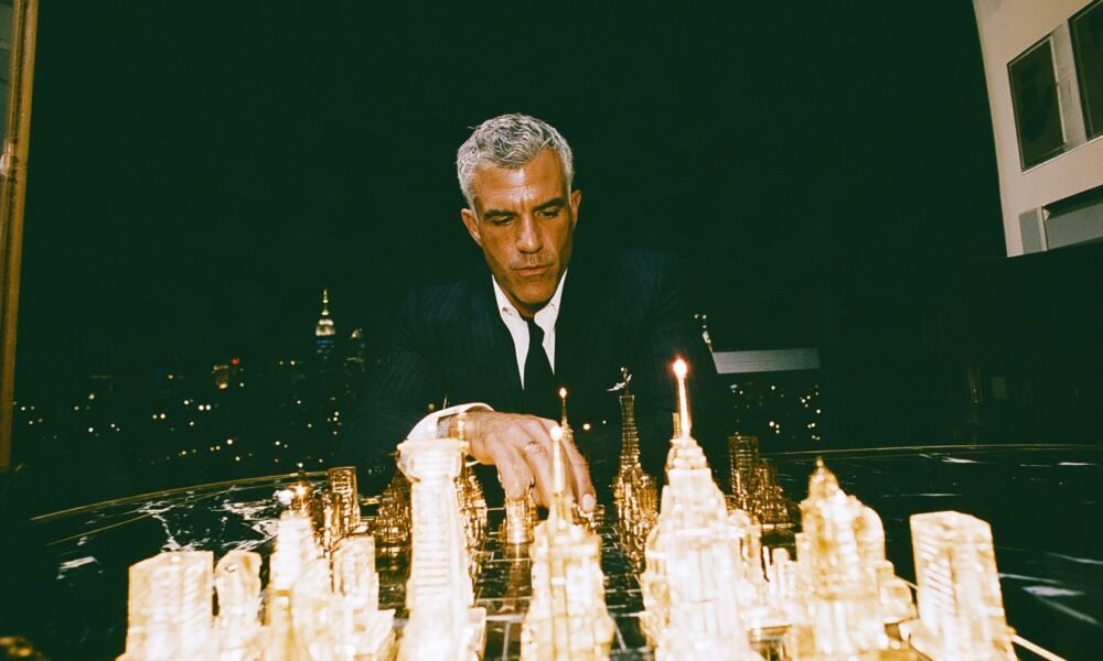 A single entrepreneur standing confidently amidst a futuristic cityscape, surrounded by glowing AI interfaces and digital agents, symbolizing a one-person billion-dollar startup.