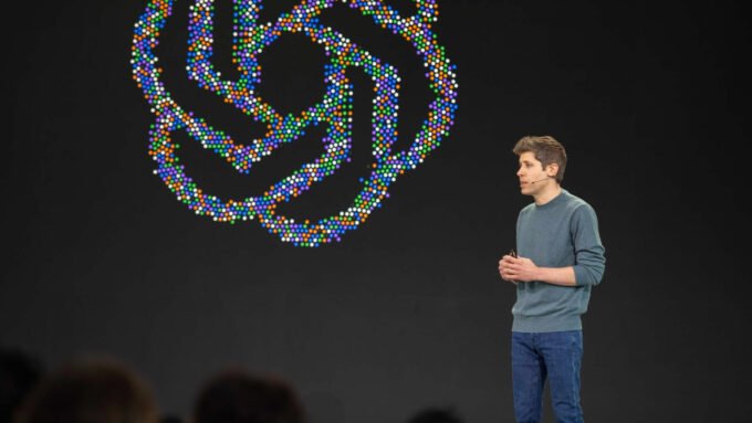 OpenAI's Revenue Reality Check: AI Stocks Stumble as $68B Figure Shrinks 9 Sam Altman, CEO of OpenAI, speaking at a developer conference, illustrating the company's financial news.