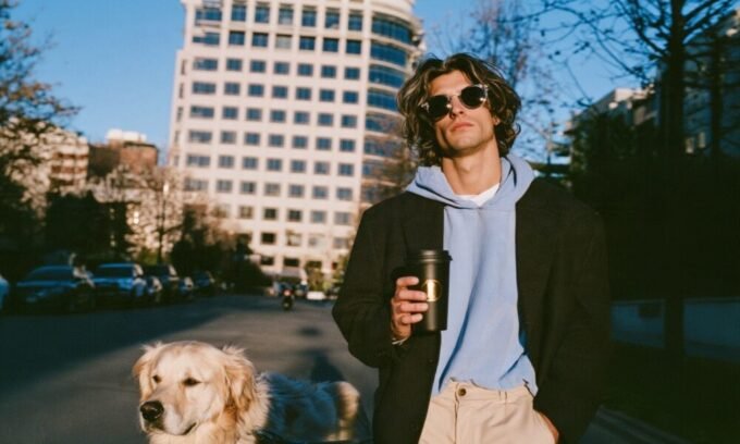 A person walking their dog, symbolizing the connection between pet care and a calm, productive workday.