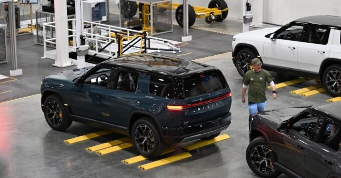 Rivian R2 electric vehicle on display, symbolizing the company's successful Q3 sales and production growth.
