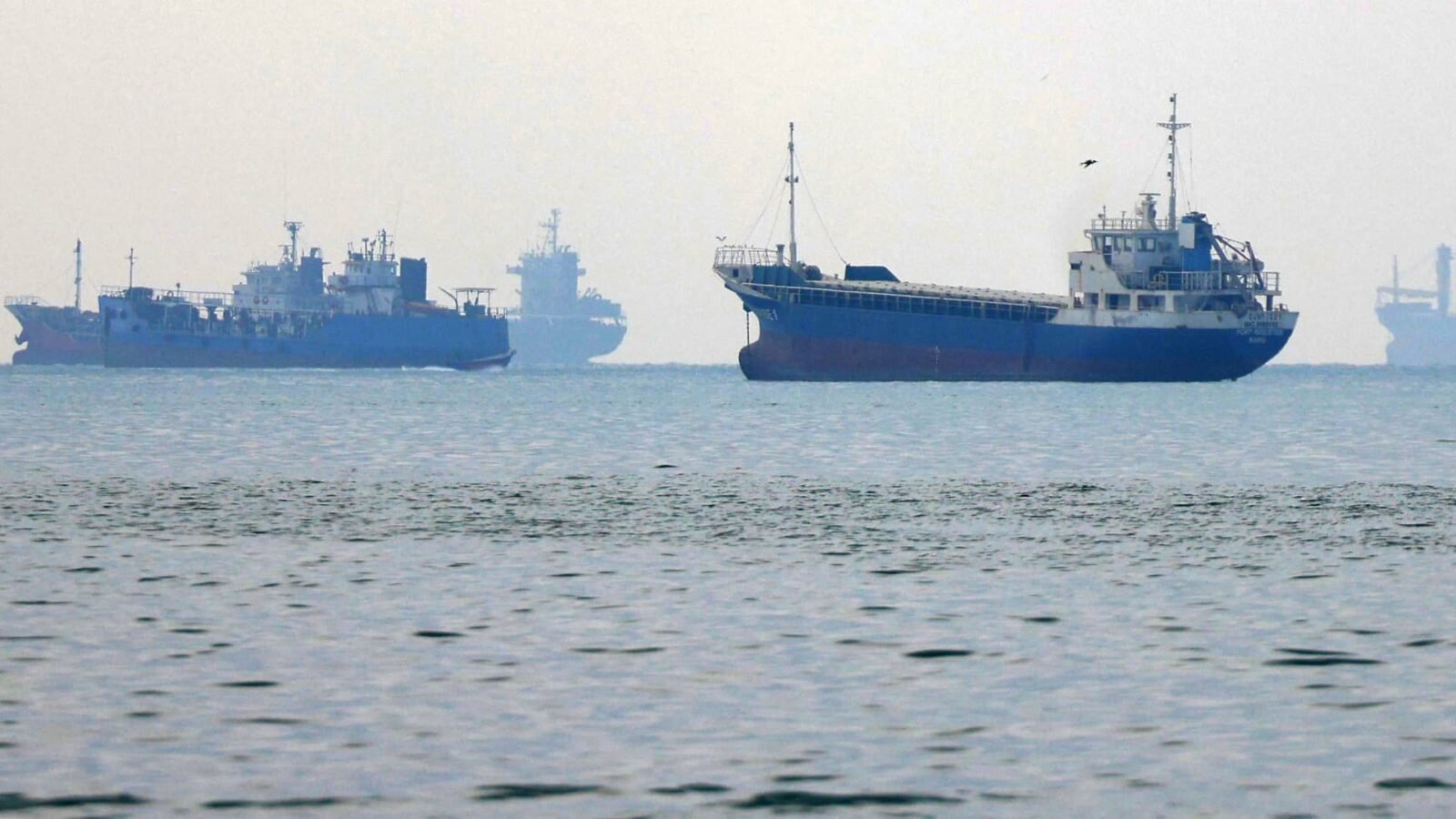 Wreckage of the GFS Pride container ship in the Strait of Hormuz after an attack