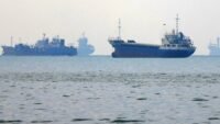 Wreckage of the GFS Pride container ship in the Strait of Hormuz after an attack