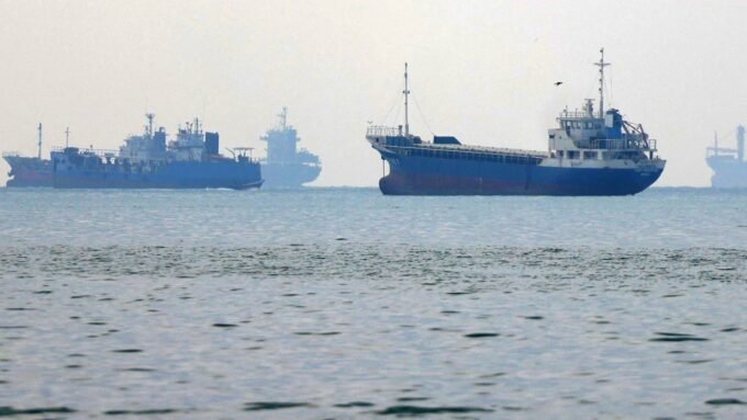 Wreckage of the GFS Pride container ship in the Strait of Hormuz after an attack
