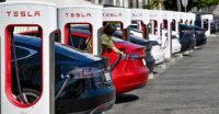 A Tesla vehicle quickly detaching from a Supercharger cable during an emergency, with the cable breaking away.