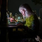 Apple's new touchscreen MacBook Pro displaying its interface