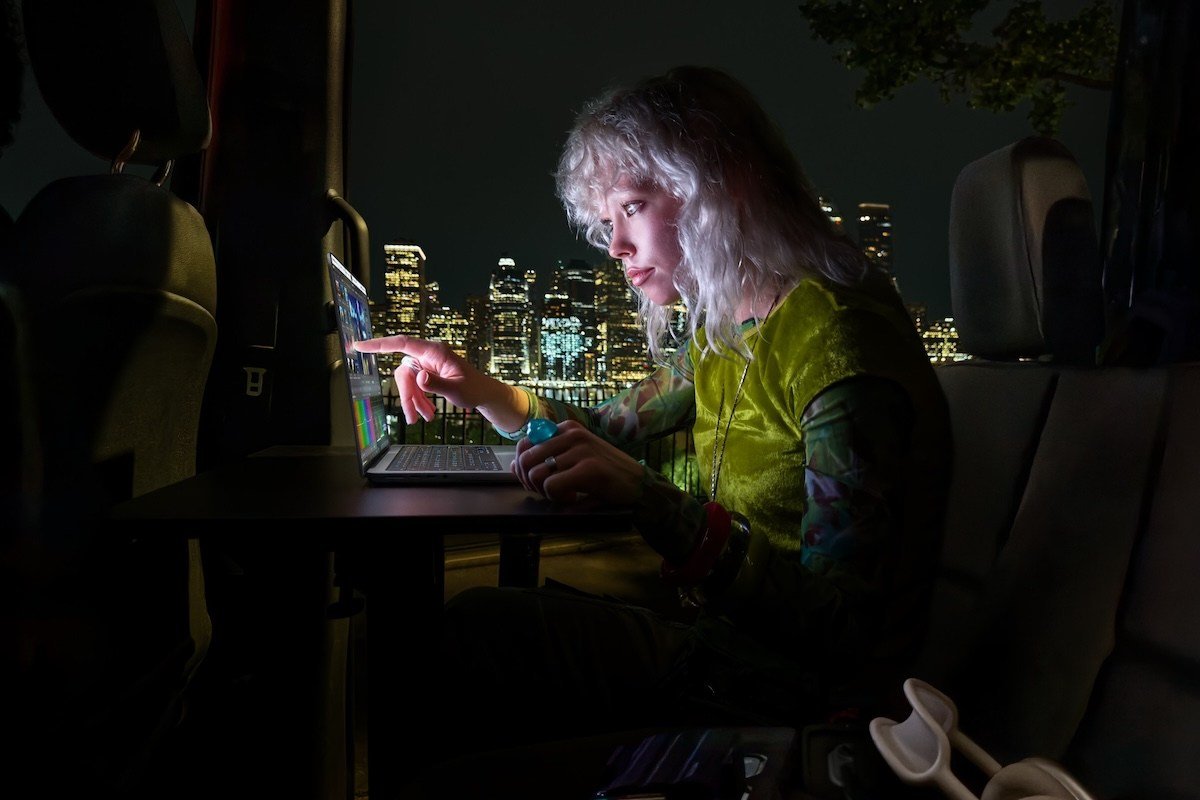 Apple's new touchscreen MacBook Pro displaying its interface