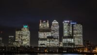 Canary Wharf skyline in London, symbolizing the UK's financial sector and its interaction with digital assets.