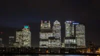 Canary Wharf skyline in London, symbolizing the UK's financial sector and its interaction with digital assets.