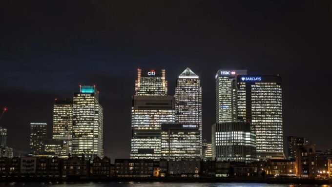 Canary Wharf skyline in London, symbolizing the UK's financial sector and its interaction with digital assets.