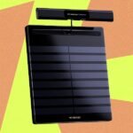 Withings BodyScan 2 smart scale with integrated handlebars and color LCD screen displaying health metrics.