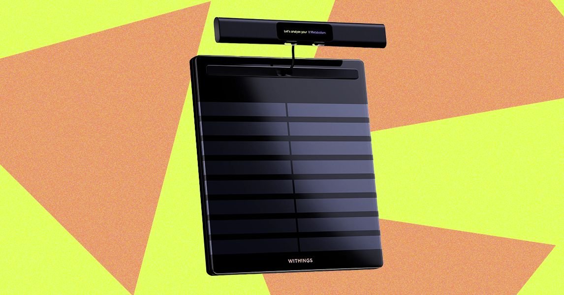 Withings BodyScan 2 smart scale with integrated handlebars and color LCD screen displaying health metrics.